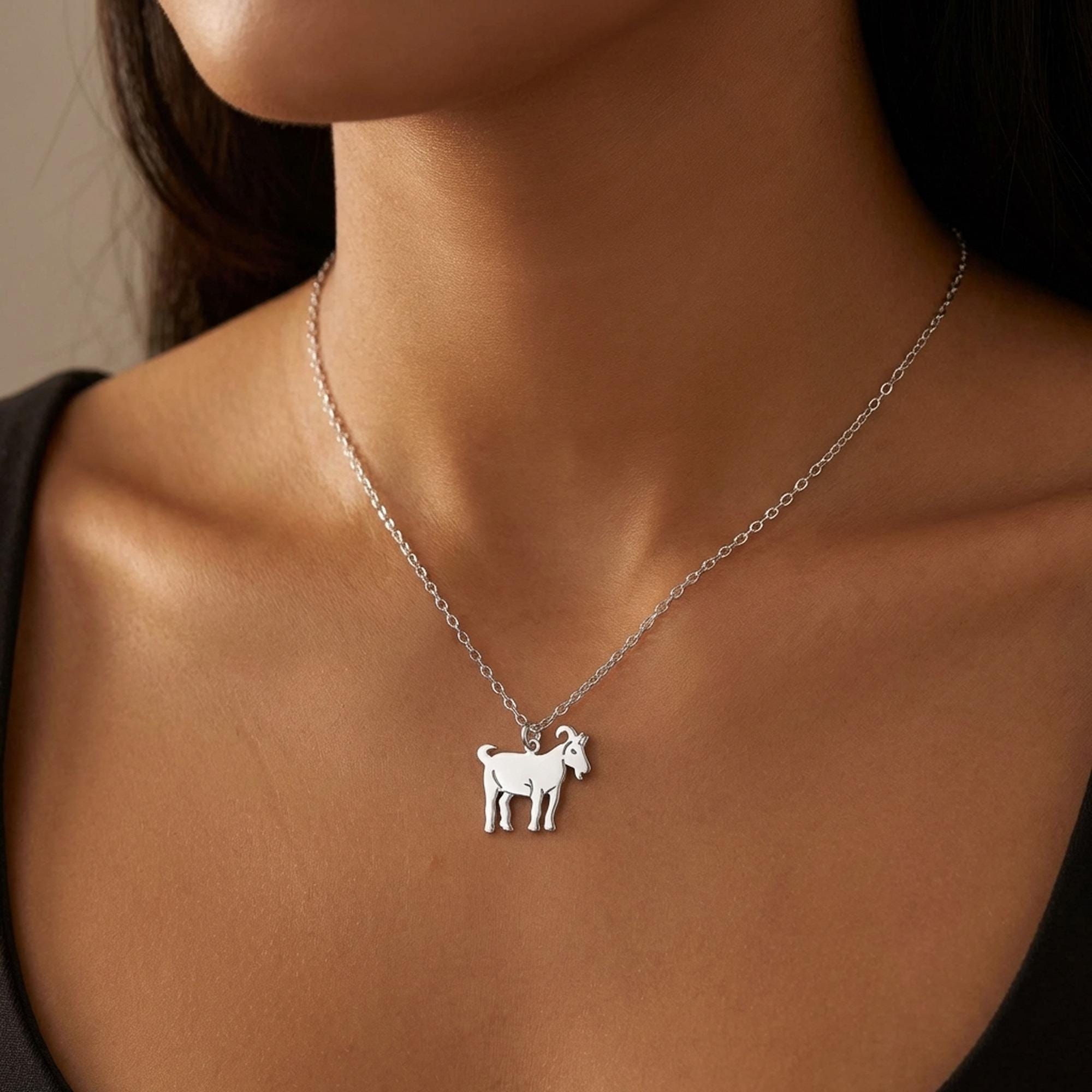 Small flat gold goat pendant in profile on a fine chain (2 of 12)