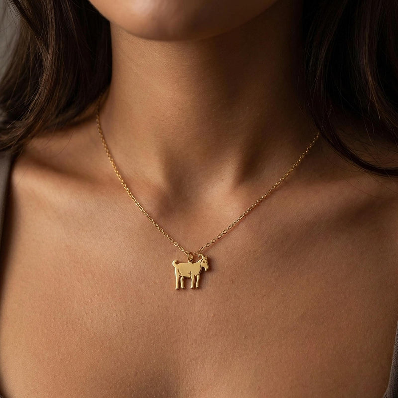 Small flat gold goat pendant in profile on a fine chain (3 of 12)
