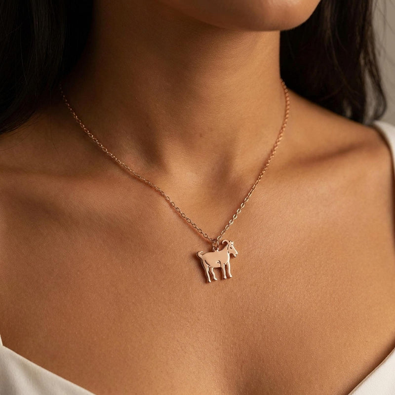 Small flat gold goat pendant in profile on a fine chain (4 of 12)