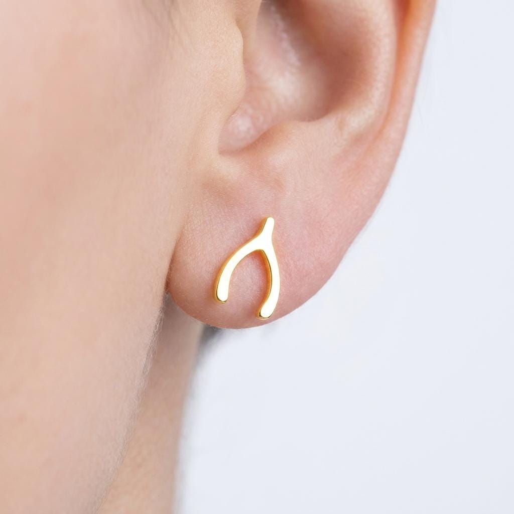 Pair of small gold wishbone stud earrings with two thin arms