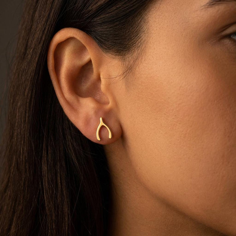 Pair of small gold wishbone stud earrings with two thin arms (3 of 8)