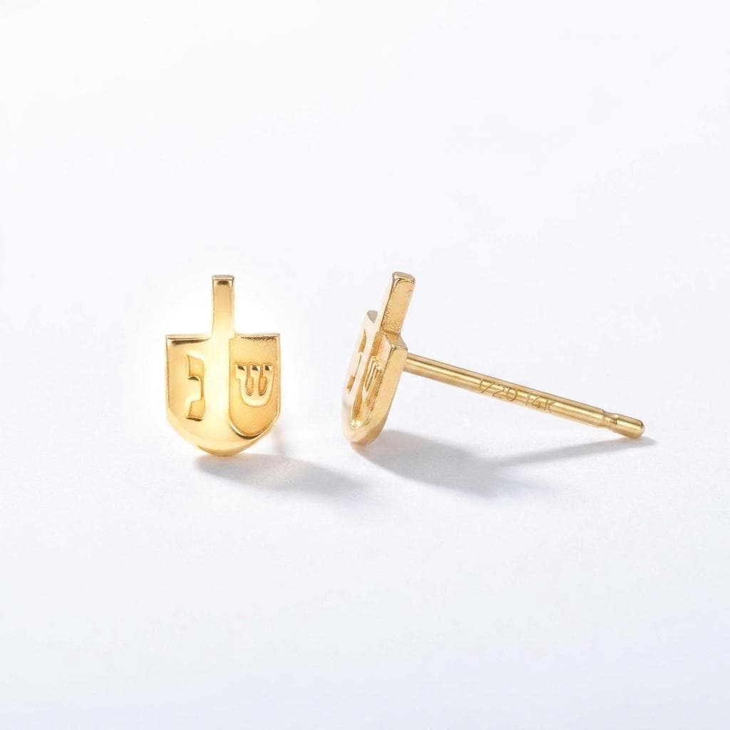 Pair of small gold dreidel stud earrings with a short handle and flat faces.