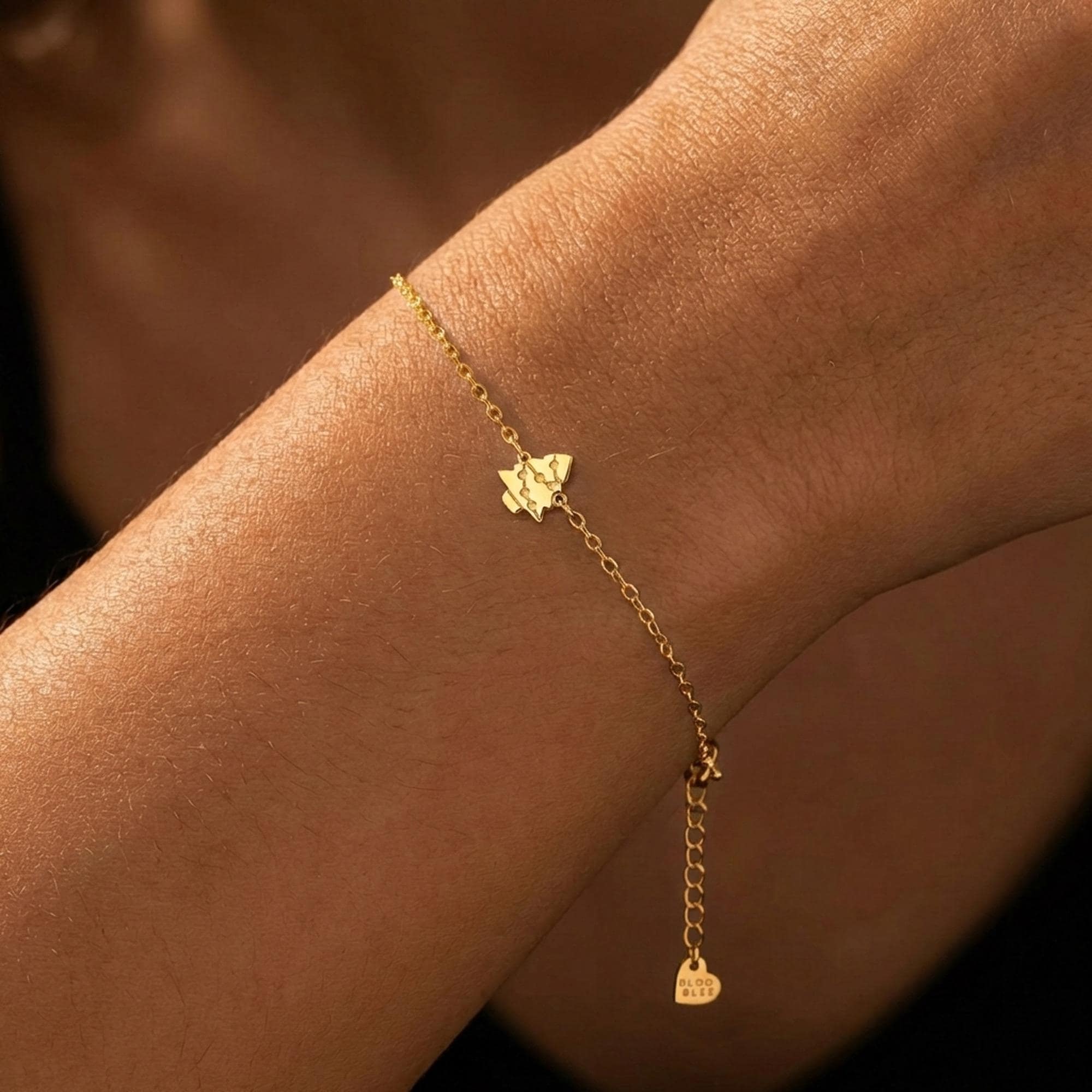 Fine gold chain bracelet with a small tiered Christmas tree charm (2 of 8)