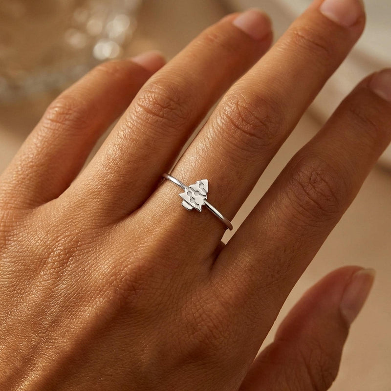 Fine gold band ring with a tiny flat Christmas tree charm on top (2 of 8)