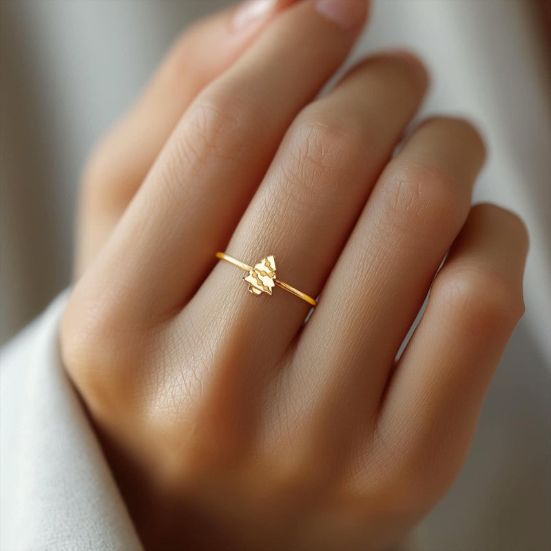 Fine gold band ring with a tiny flat Christmas tree charm on top (7 of 8)