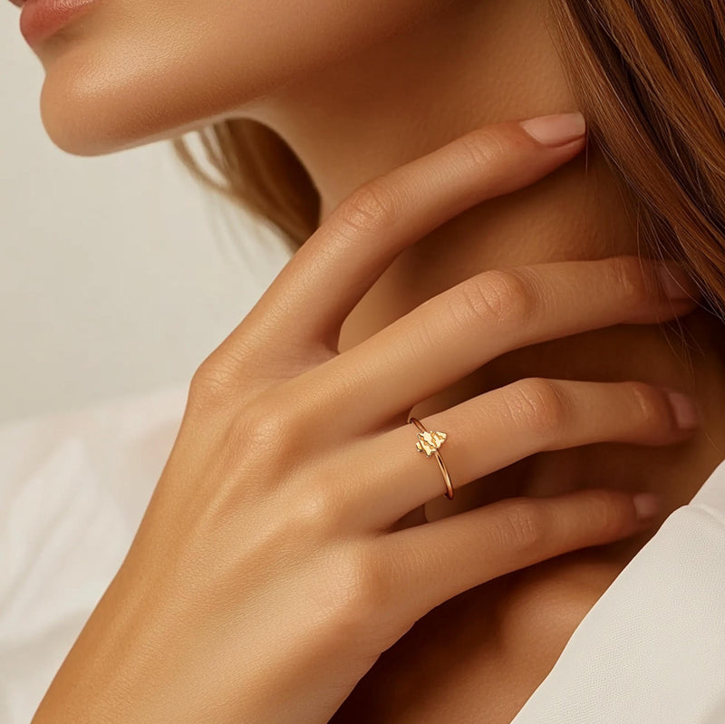 Fine gold band ring with a tiny flat Christmas tree charm on top (8 of 8)