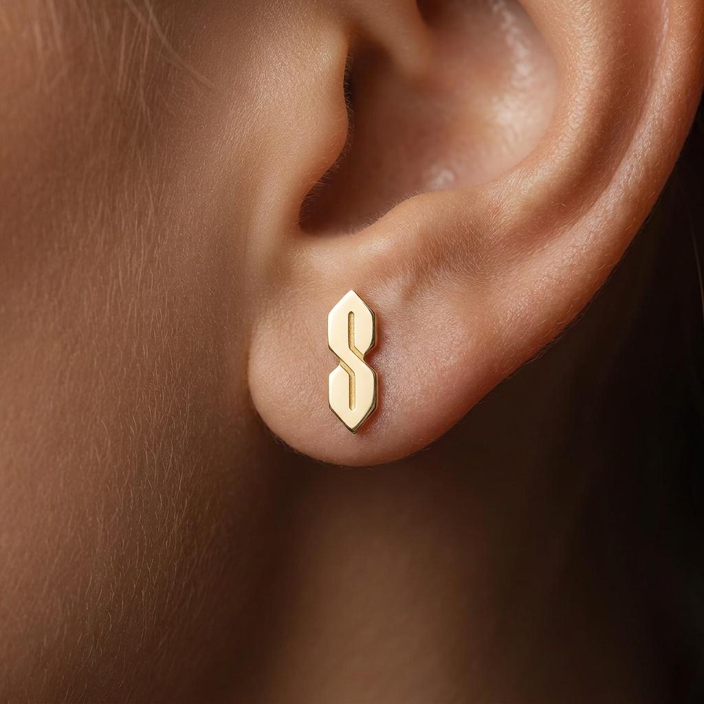 Narrow gold S shaped stud earrings, geometric ninetes doodle motif, shown as a pair (2 of 9)