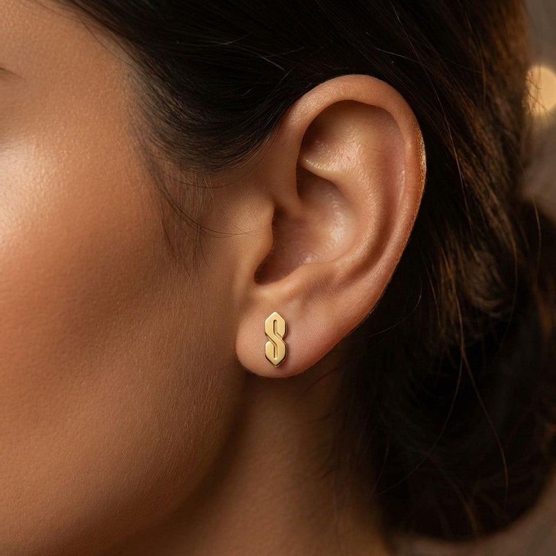 Narrow gold S shaped stud earrings, geometric ninetes doodle motif, shown as a pair (3 of 9)