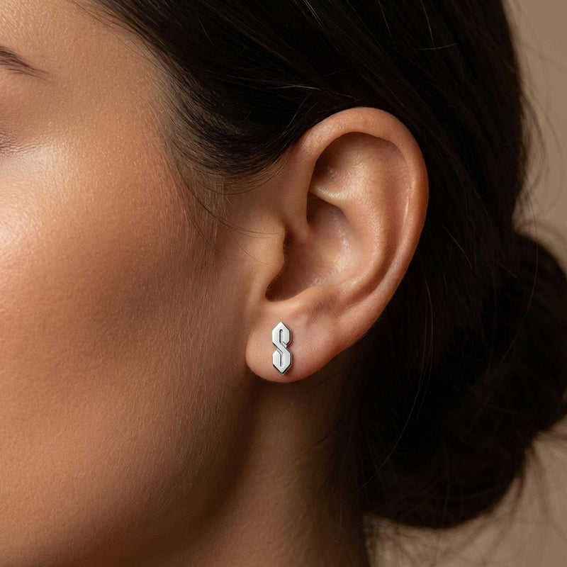 Narrow gold S shaped stud earrings, geometric ninetes doodle motif, shown as a pair (4 of 9)