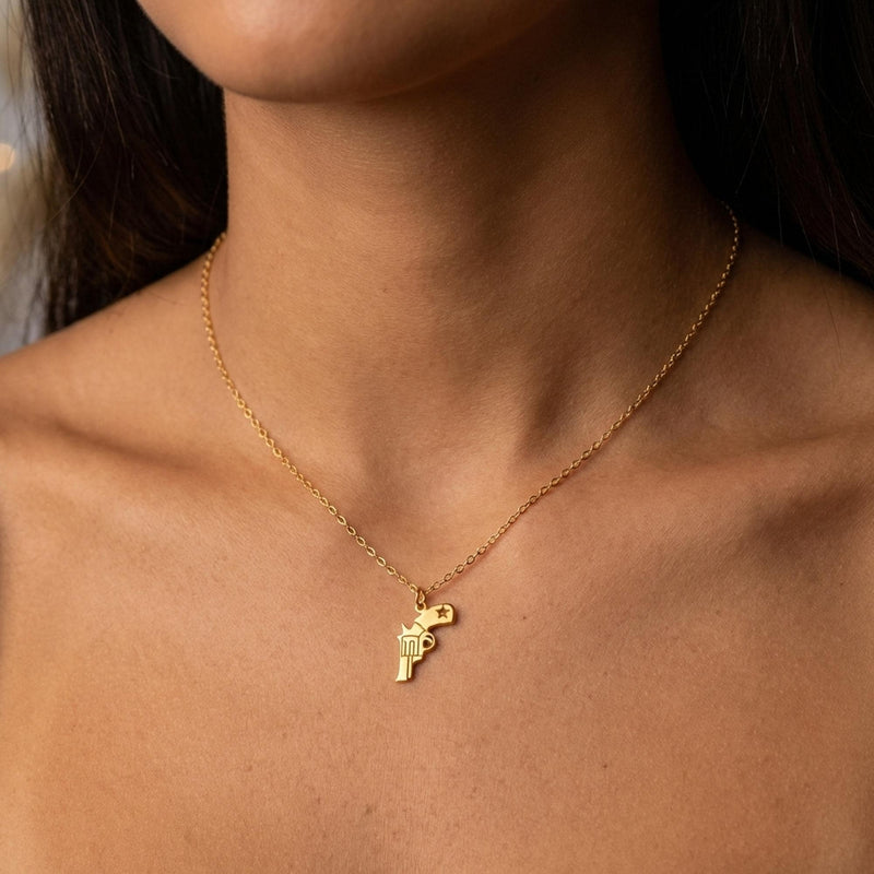 Fine gold necklace with a very small flat revolver pendant (2 of 8)