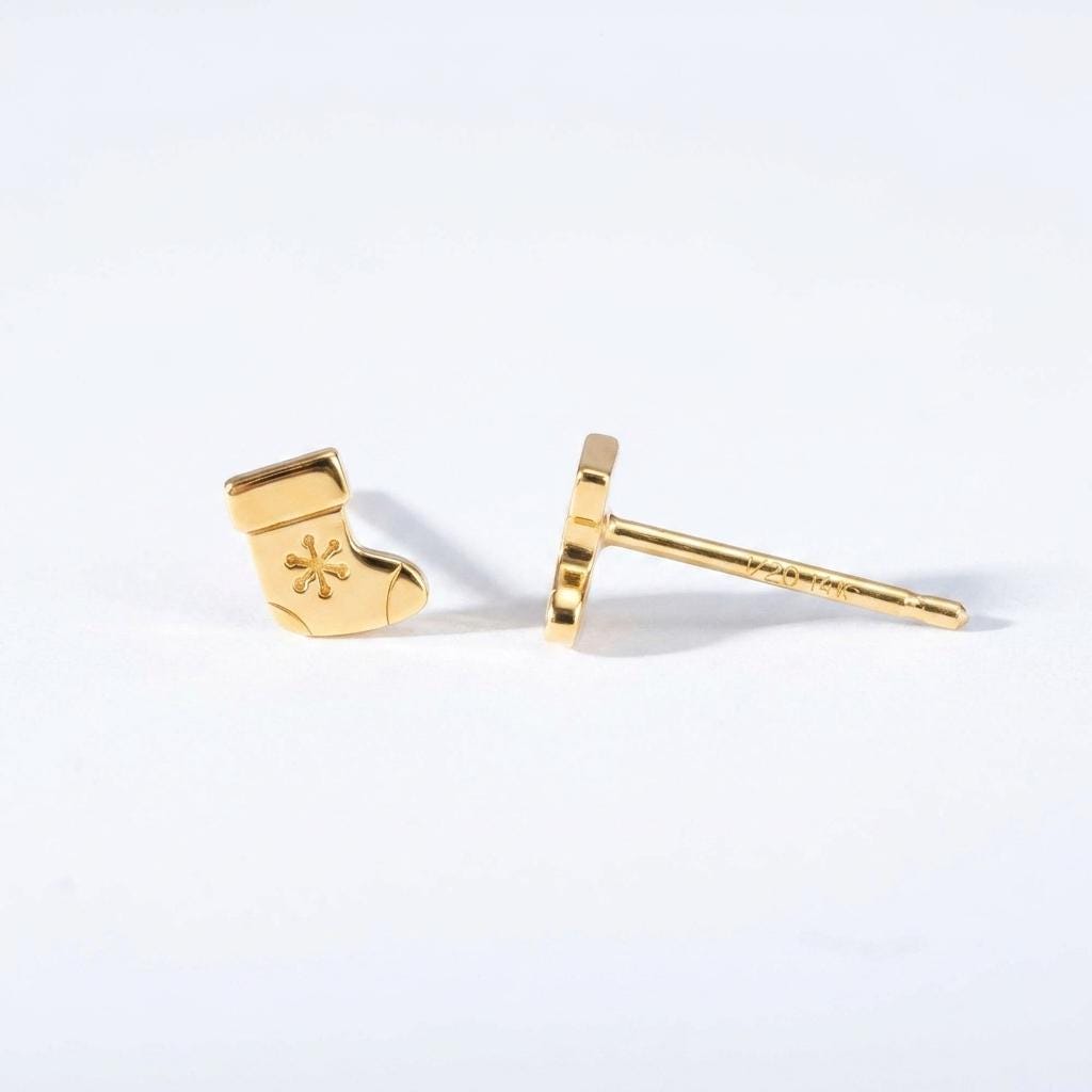 Pair of small gold Christmas stocking stud earrings with a folded cuff