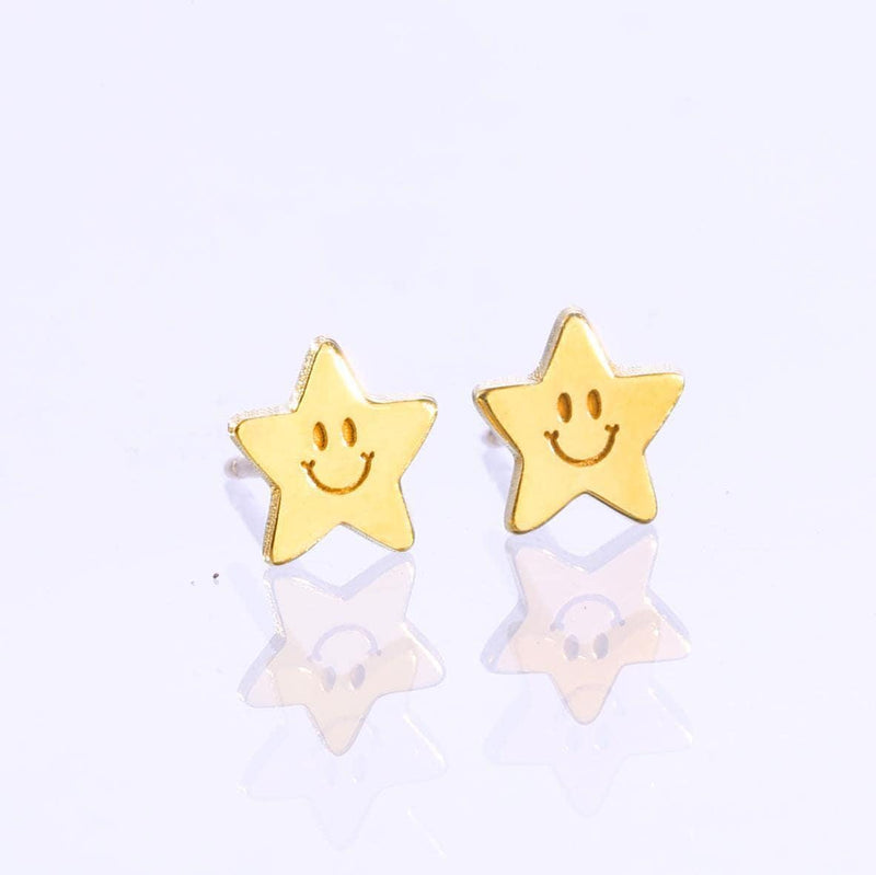 Pair of gold star stud earrings with a smiling face on each star