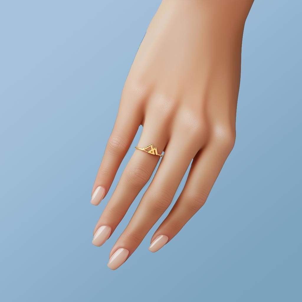 Slim gold ring topped with an angular geometric mountain range design (2 of 7)