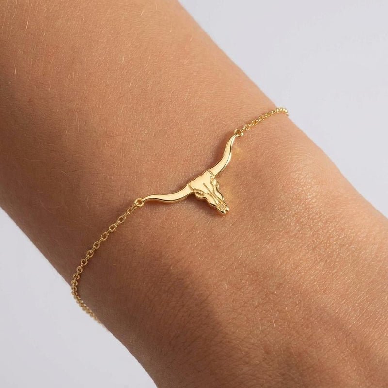 Fine gold chain bracelet with a small longhorn steer head charm