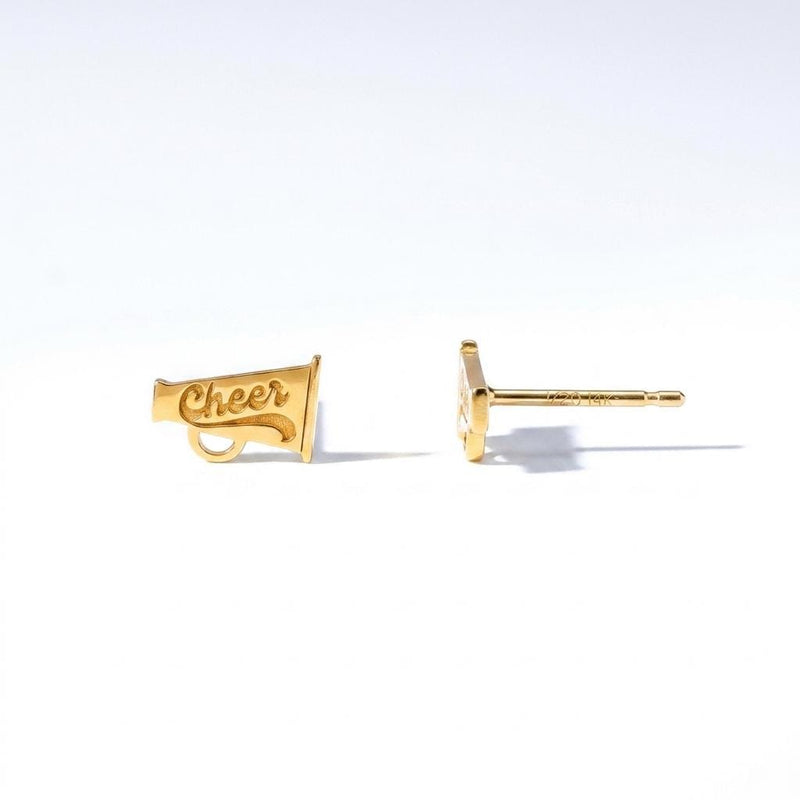 Pair of cheerleader stud earrings in gold showing a mid-jump silhouette