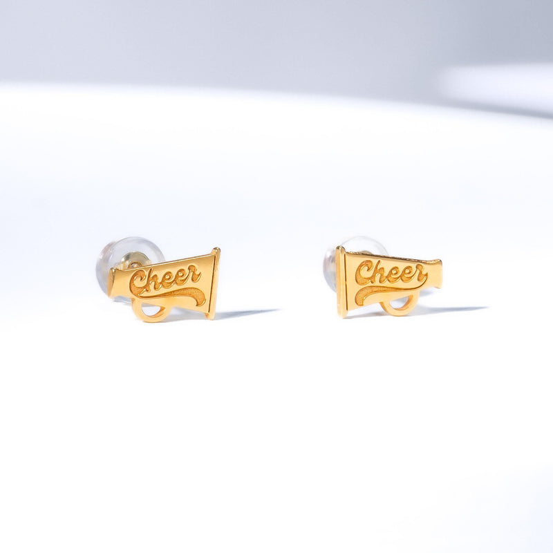 Pair of cheerleader stud earrings in gold showing a mid-jump silhouette (3 of 6)