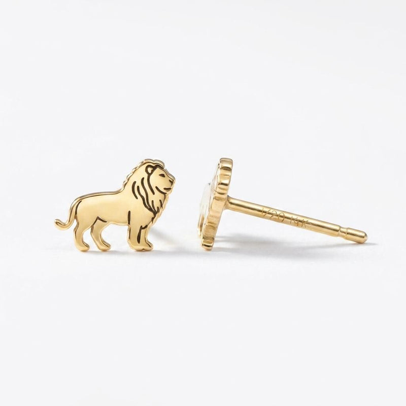 Pair of gold lion head stud earrings with textured manes