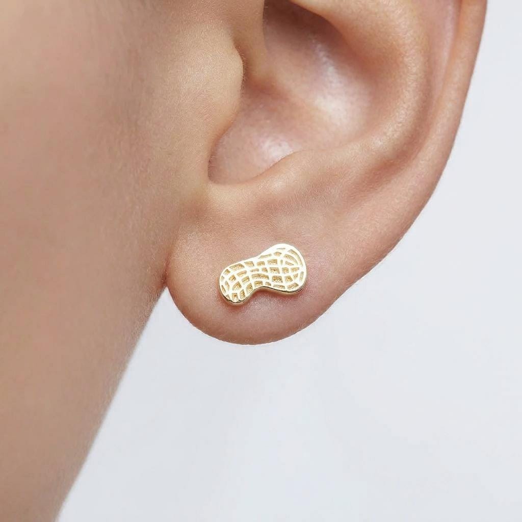 Pair of small gold peanut shell stud earrings