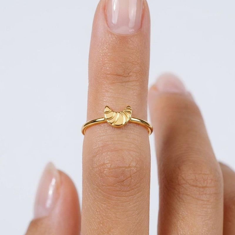 Slim gold stacking ring topped with a small layered croissant (3 of 9)