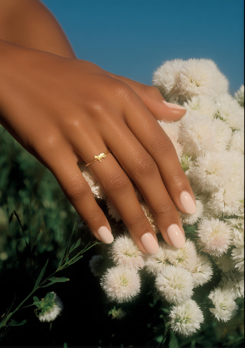 Slim gold stacking ring with a small flat cow design on the top (2 of 9)