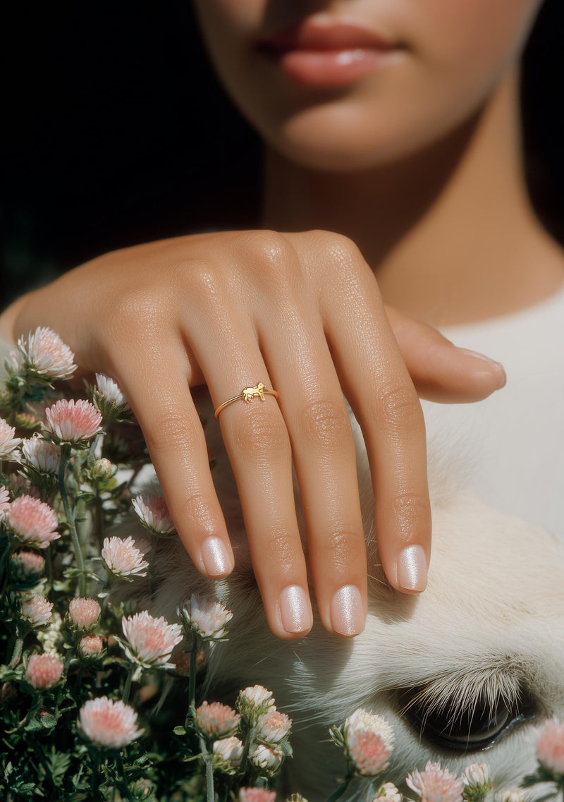 Slim gold stacking ring with a small flat cow design on the top (3 of 9)