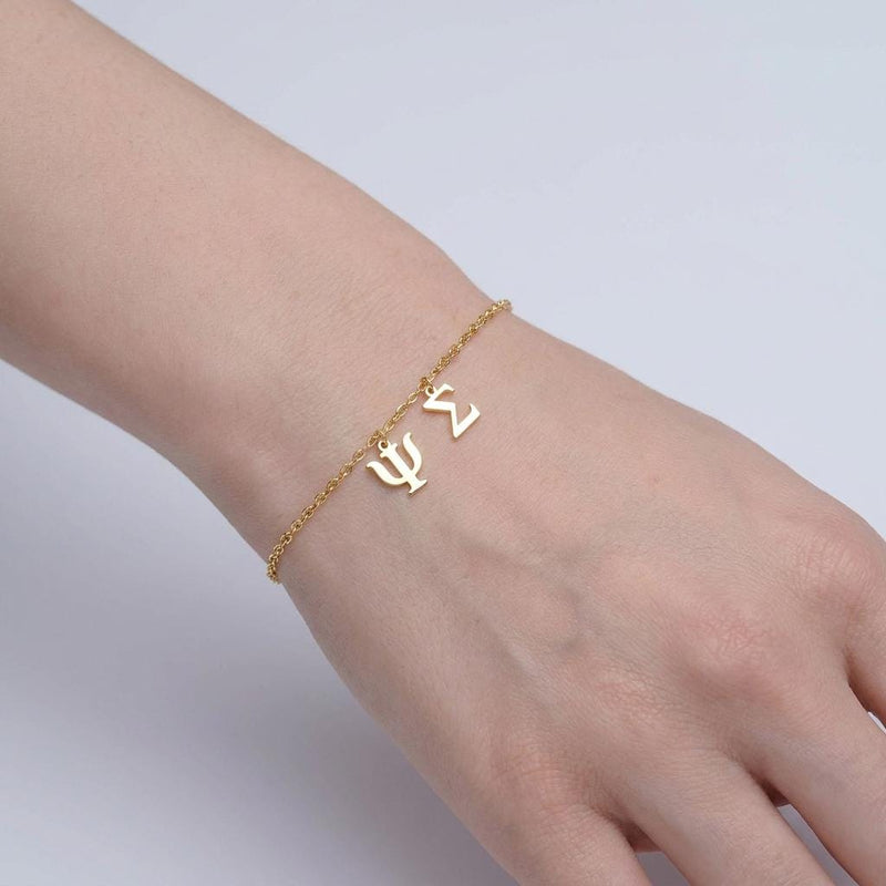 Fine gold chain bracelet with several small Greek letter and symbol charms (2 of 13)