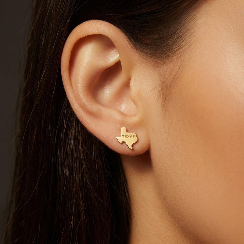 Pair of small gold stud earrings shaped like the state of Texas. (4 of 9)