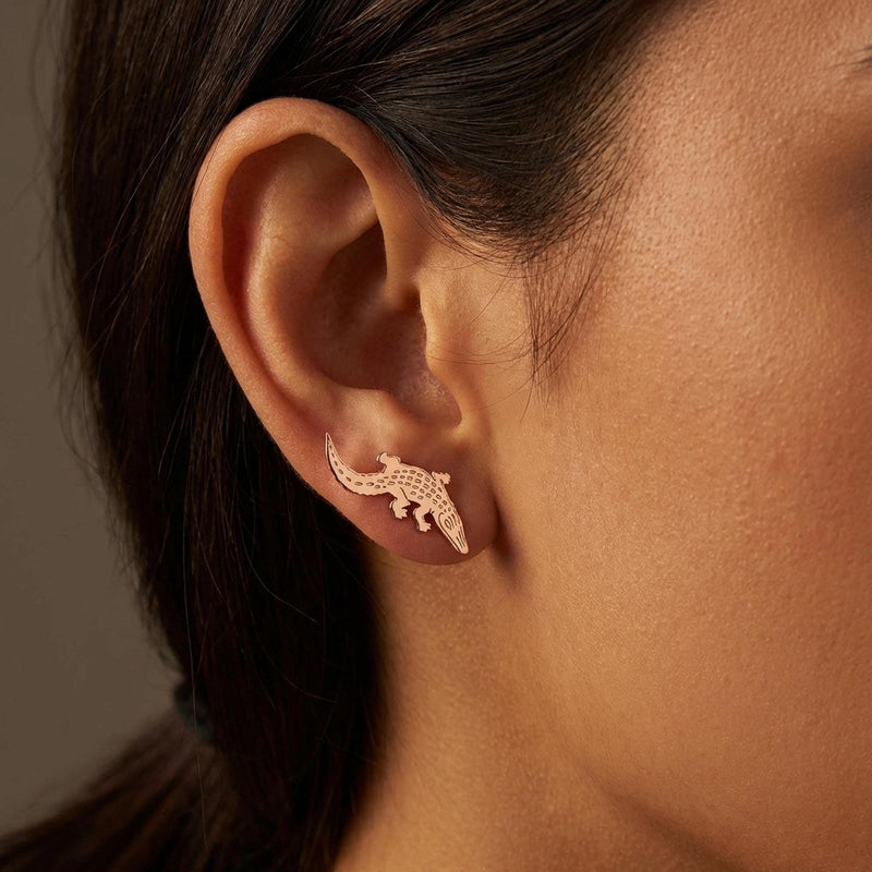 Gold alligator ear climber earrings with curved tails, shown as a pair. (11 of 12)