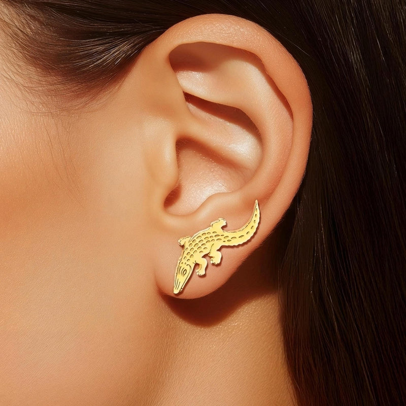 Gold alligator ear climber earrings with curved tails, shown as a pair. (12 of 12)