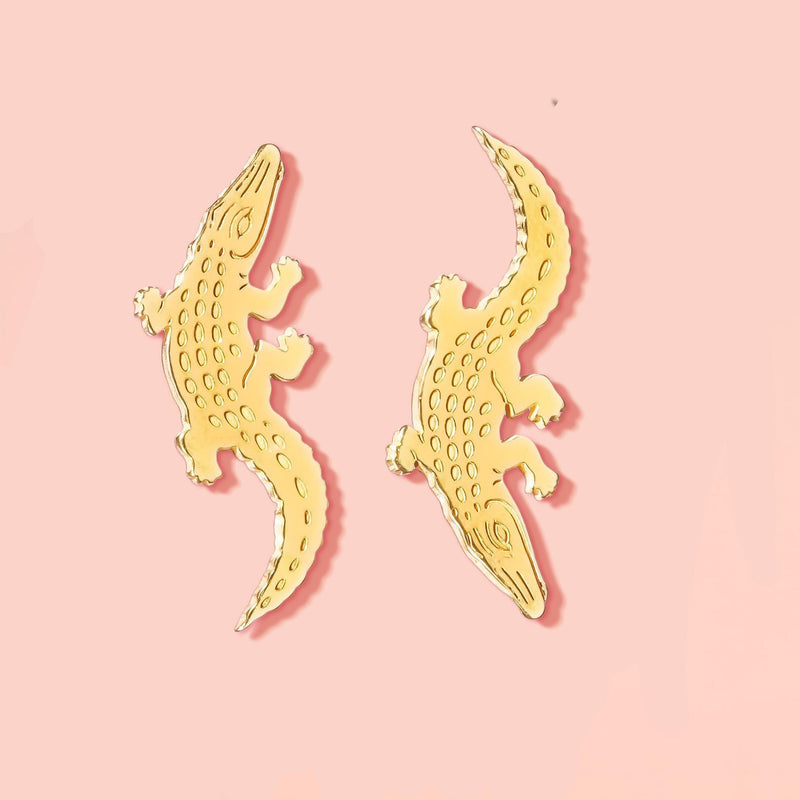 Gold alligator ear climber earrings with curved tails, shown as a pair. (5 of 12)