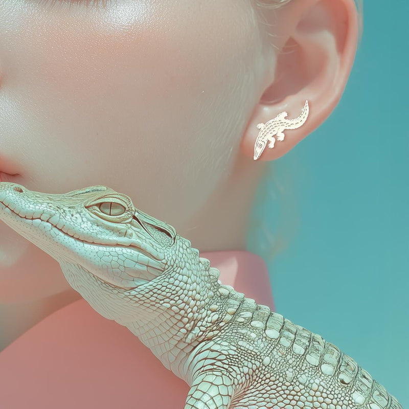 Gold alligator ear climber earrings with curved tails, shown as a pair. (6 of 12)