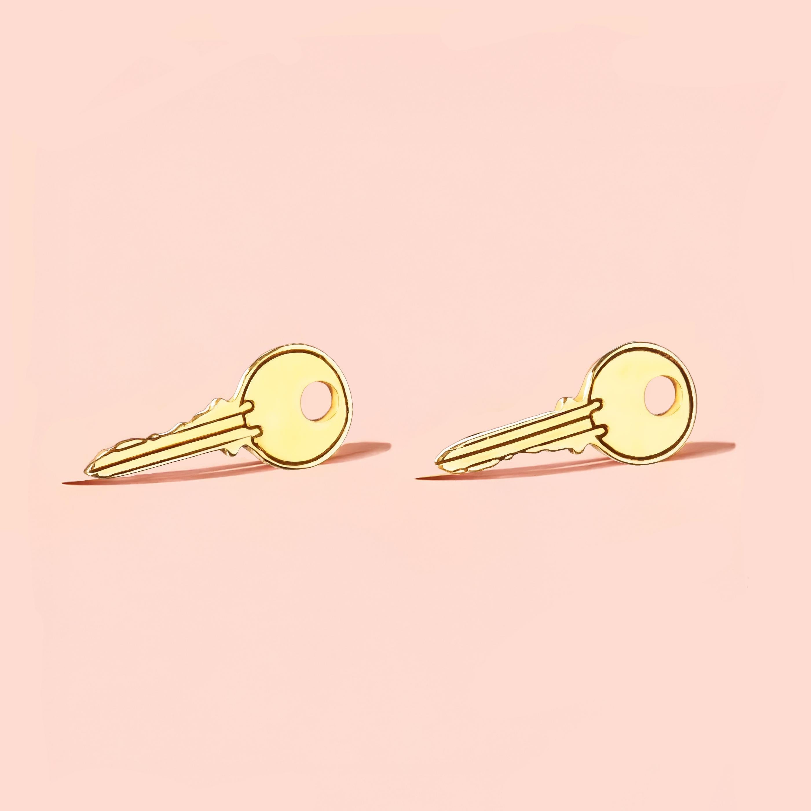 Pair of narrow old fashioned house key stud earrings in gold (2 of 9)