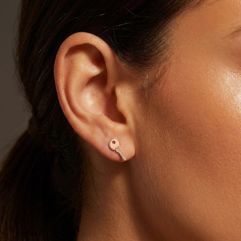 Pair of narrow old fashioned house key stud earrings in gold (6 of 9)