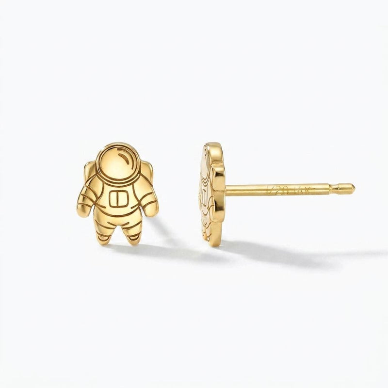Pair of small gold astronaut stud earrings shown front on (8 of 14)