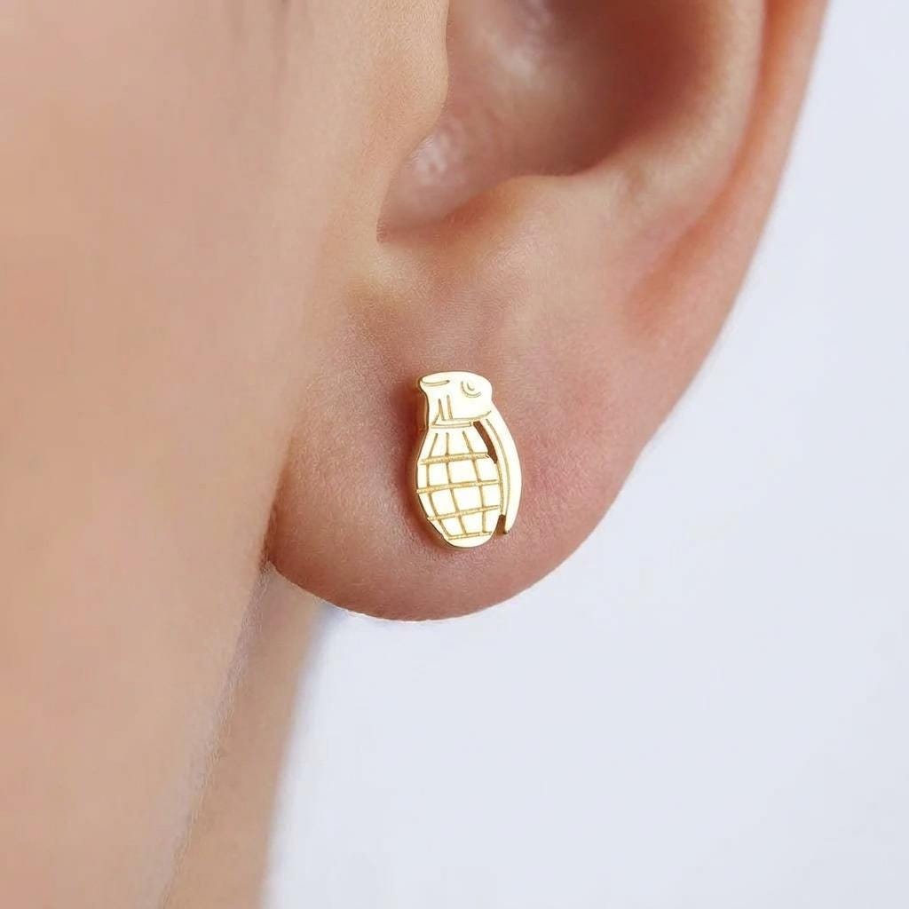 Pair of tiny gold grenade stud earrings with textured body and pin, on white (2 of 8)