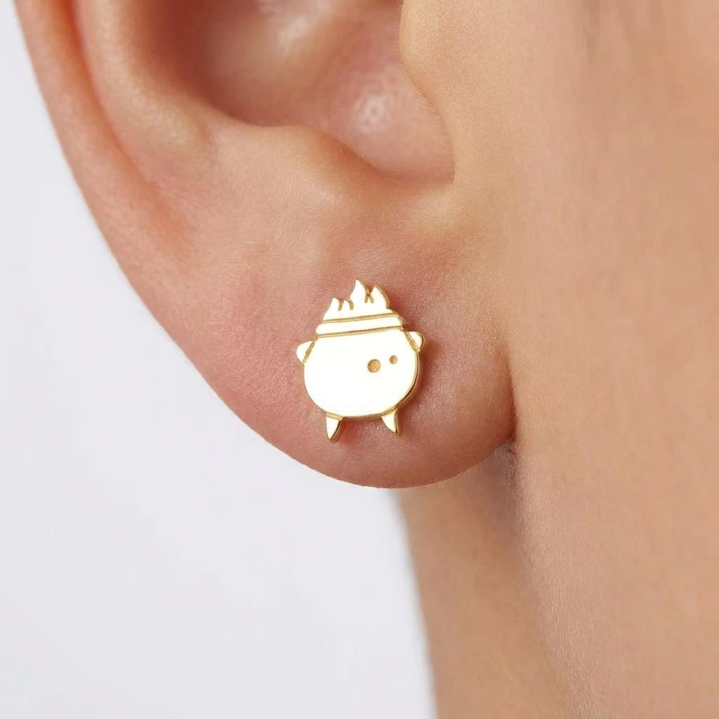 Pair of small gold witch cauldron stud earrings with a curved handle