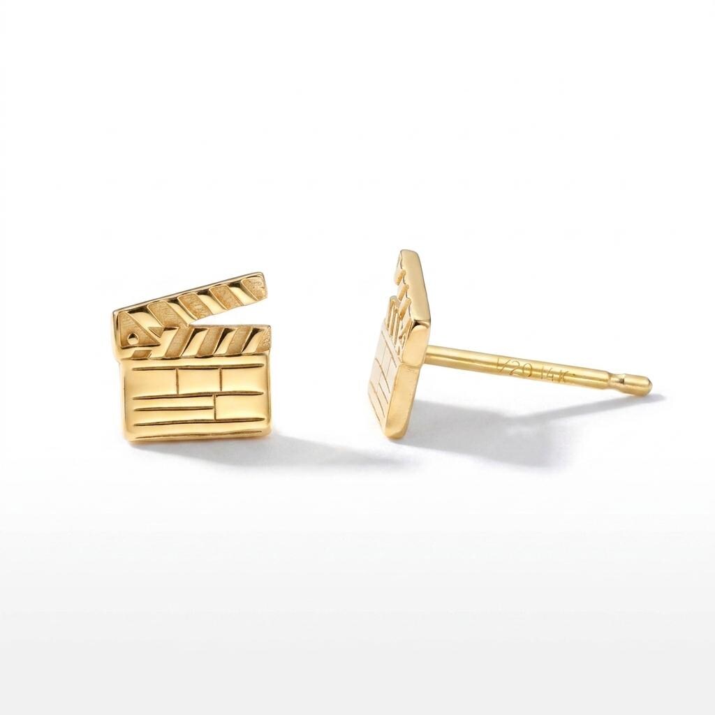 Pair of small gold film clapboard stud earrings with striped slate detail