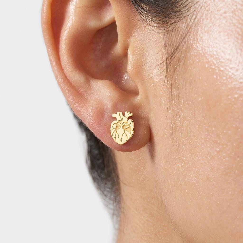 Pair of gold anatomical heart stud earrings with ventricles and aorta detail (2 of 10)