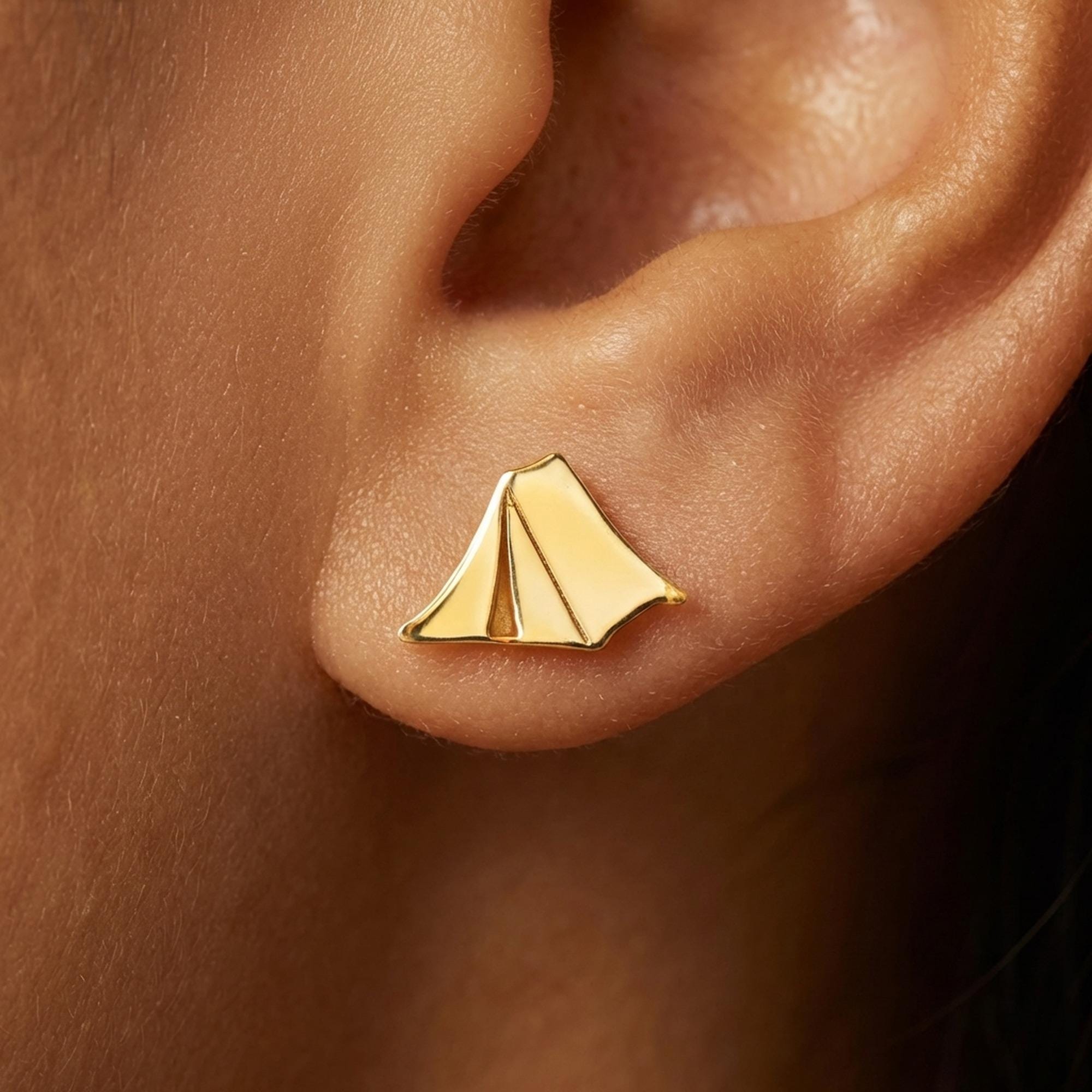 Pair of small gold A frame camping tent stud earrings with a scored door flap. (2 of 7)
