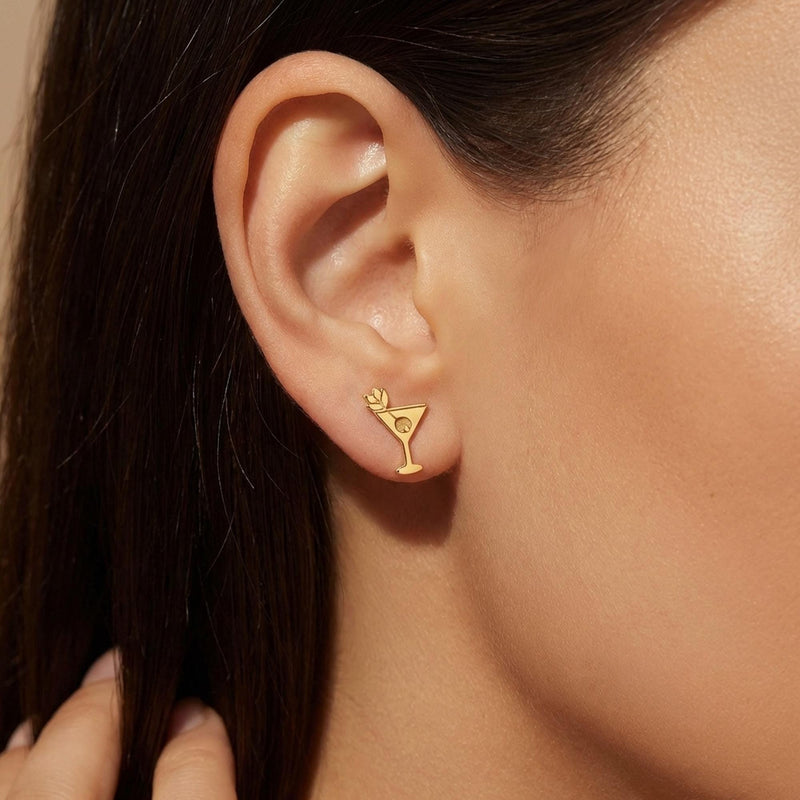 Small gold martini glass stud earrings with an olive on a pick, shown as a pair (10 of 12)