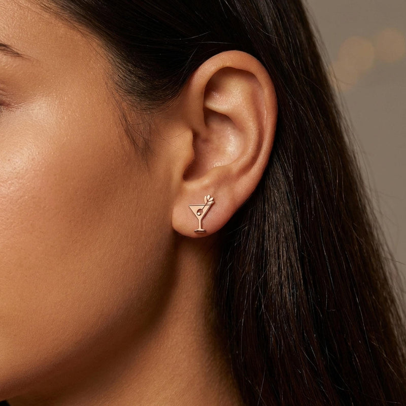 Small gold martini glass stud earrings with an olive on a pick, shown as a pair (4 of 12)