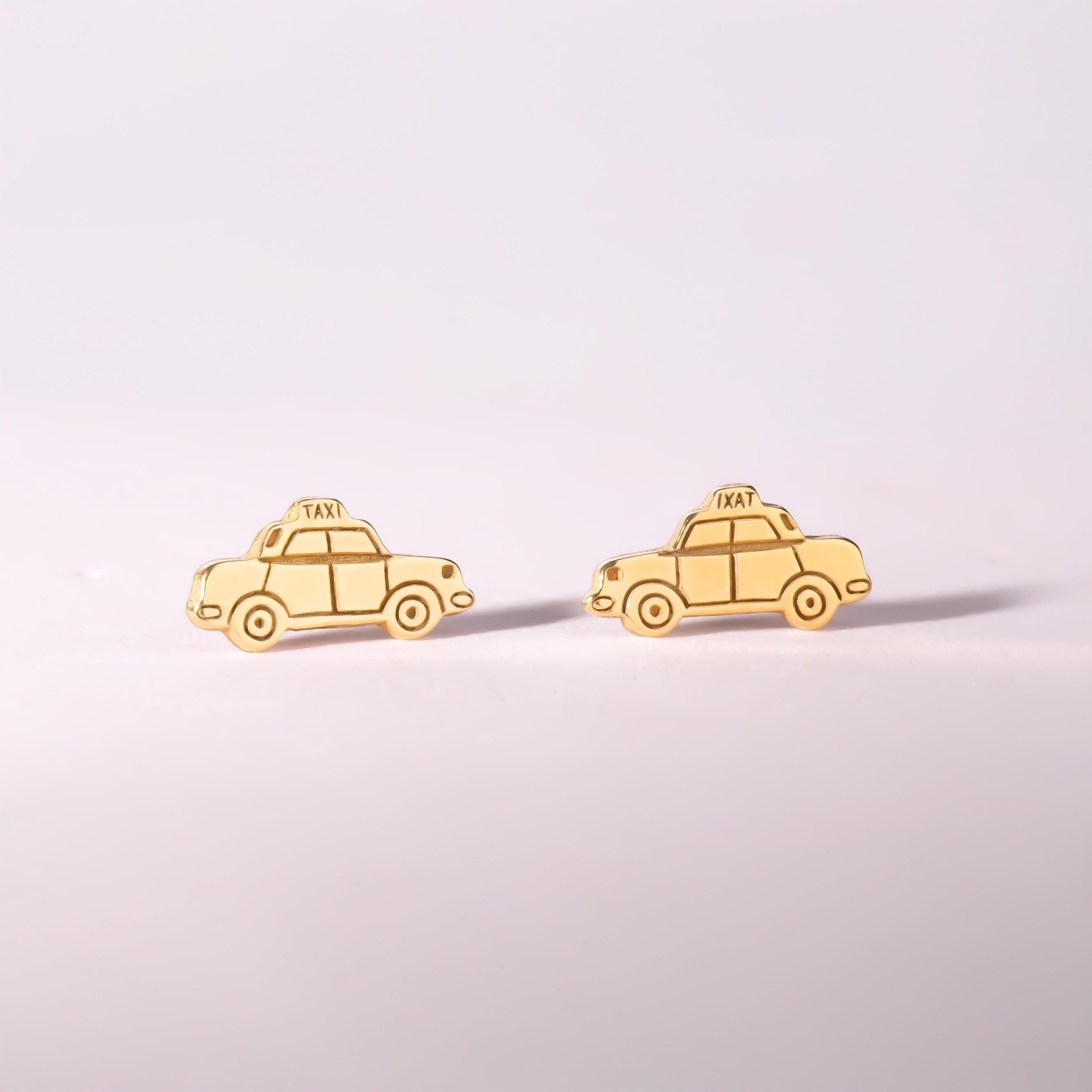 Pair of gold taxi cab stud earrings shown in profile with a roof light (2 of 5)