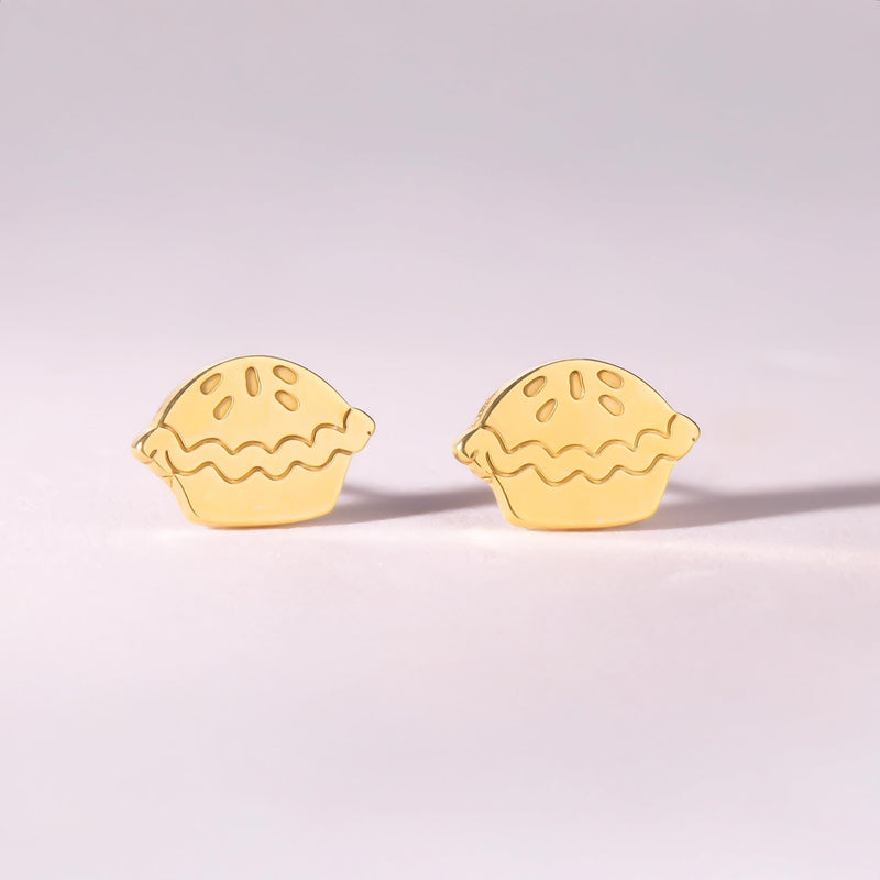 Pair of tiny gold pie slice stud earrings with lattice crust, white background. (2 of 7)
