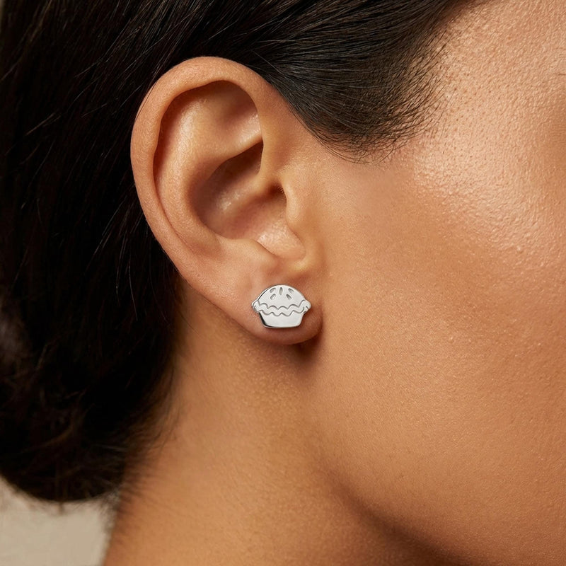 Pair of tiny gold pie slice stud earrings with lattice crust, white background. (3 of 7)