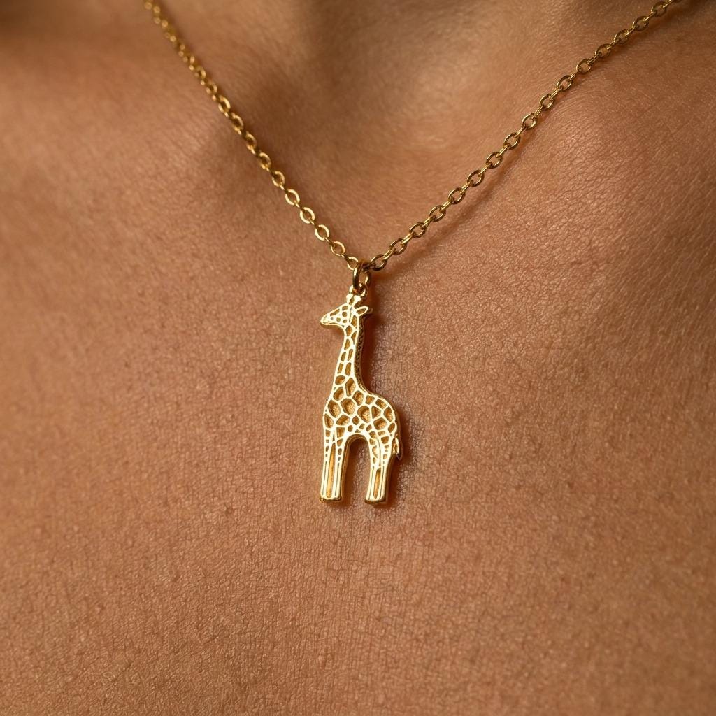 Fine gold chain necklace with a small standing giraffe pendant (2 of 10)