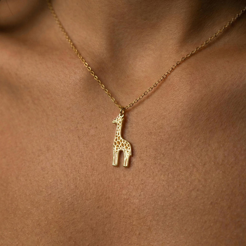 Fine gold chain necklace with a small standing giraffe pendant (3 of 10)