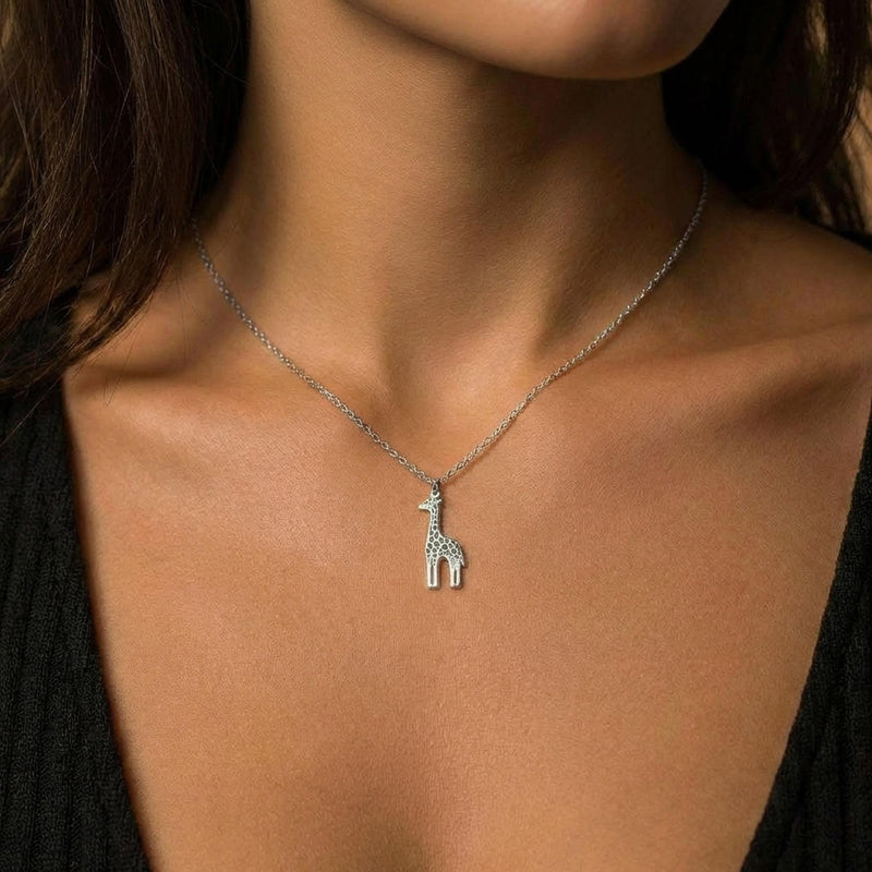 Fine gold chain necklace with a small standing giraffe pendant (6 of 10)