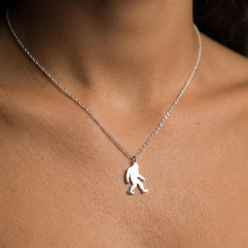 Fine gold chain necklace with a small walking Bigfoot sasquatch pendant (3 of 8)