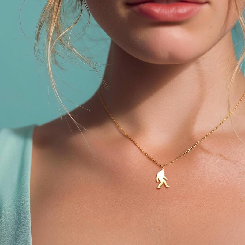 Fine gold chain necklace with a small walking Bigfoot sasquatch pendant (4 of 8)