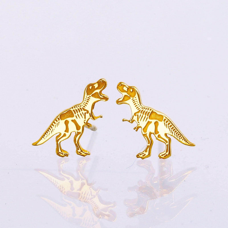 Small gold T-rex skeleton pendant in profile on a fine cable chain.